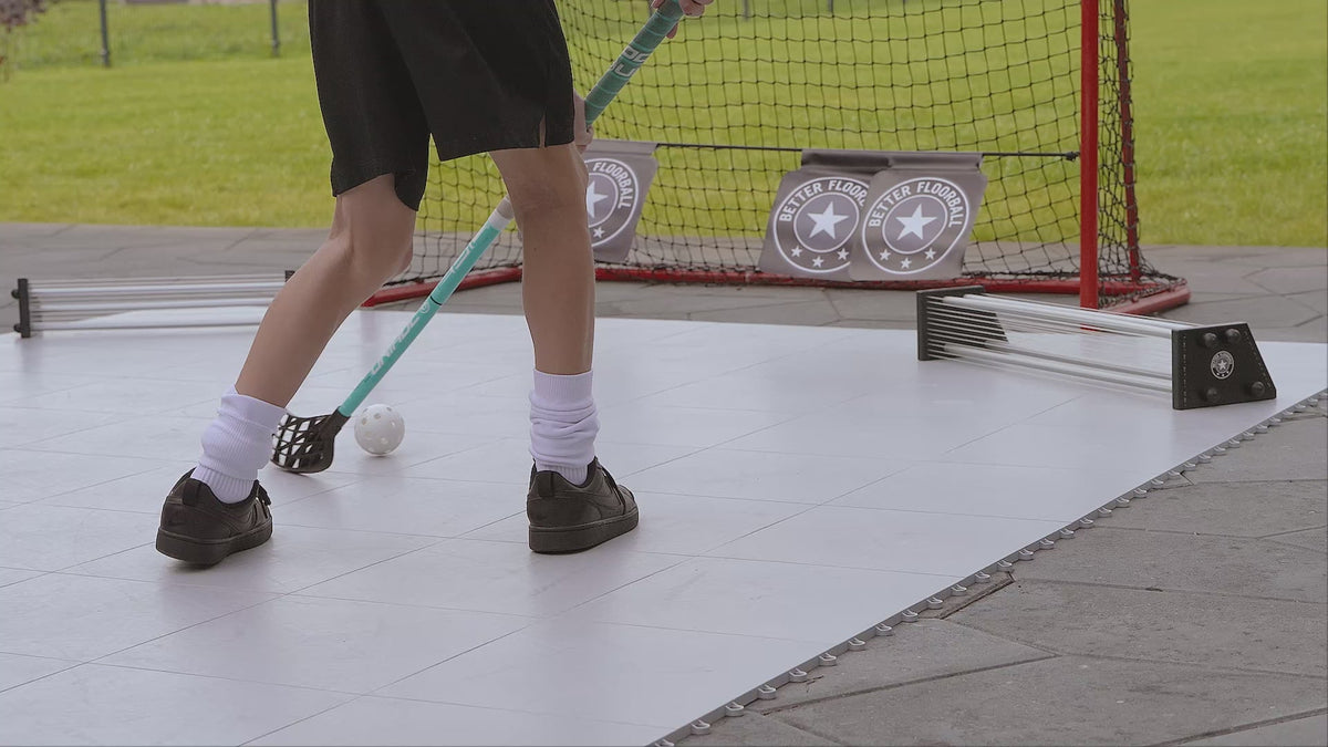 Player receiving the ball from the passer and shooting at goal